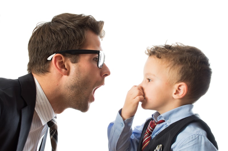 Older man with bad breath talking to a child