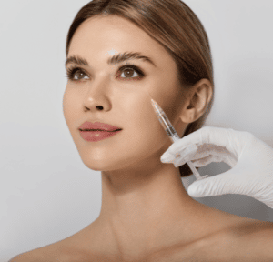 woman receiving botox injection in face below eye