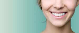 Woman with healthy teeth after dental cleaning in Boulder, CO