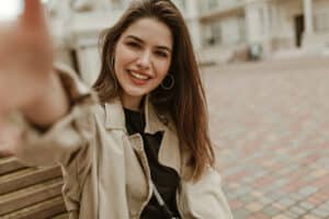 Woman enjoying healthy smile after Same Day Crowns in Boulder, CO