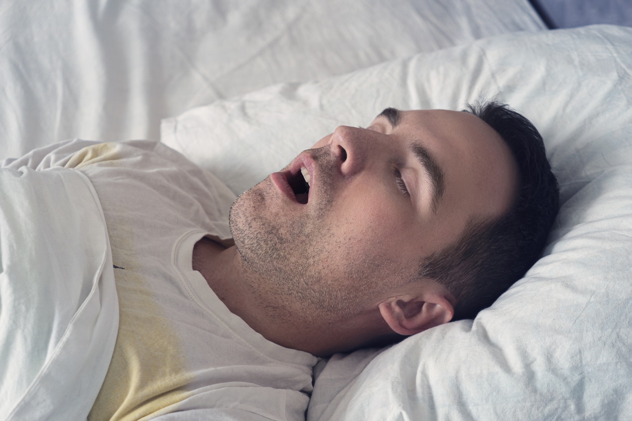 Man with sleep apnea in Boulder snoring